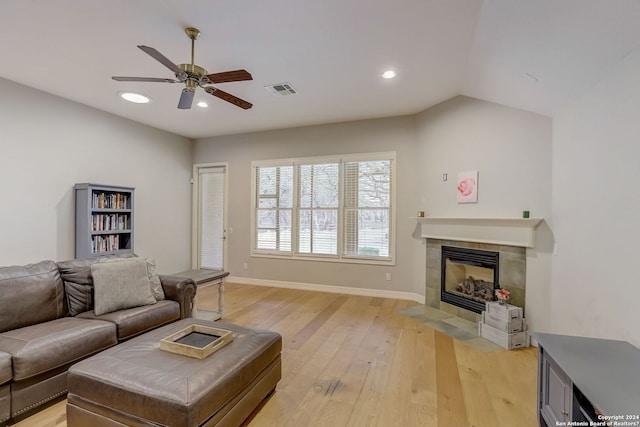 154 Roseheart, San Antonio, TX 78259 - living room with ceiling fan, a tile fireplace, light wood-style flooring, baseboards, and recessed lighting