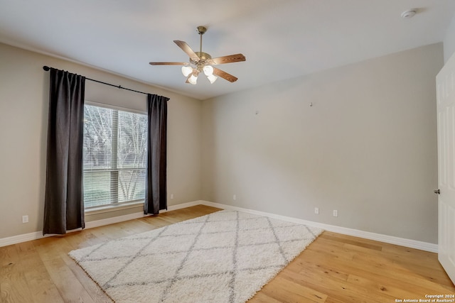 154 Roseheart, San Antonio, TX 78259 - empty room featuring wood finished floors, ceiling fan, baseboards, and a smoke detector