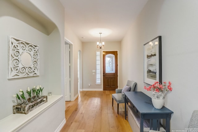 154 Roseheart, San Antonio, TX 78259 - foyer featuring light wood-style floors, a chandelier, and baseboards