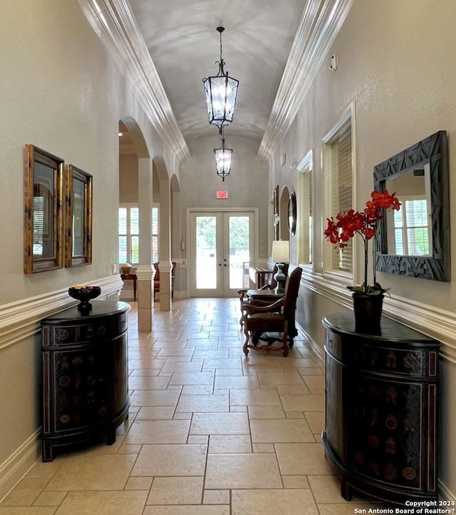154 Roseheart, San Antonio, TX 78259 - foyer with french doors, arched walkways, vaulted ceiling, baseboards, and healthy amount of natural light