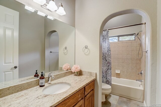 154 Roseheart, San Antonio, TX 78259 - bathroom with toilet, vanity, shower / bath combo with shower curtain, and tile patterned floors