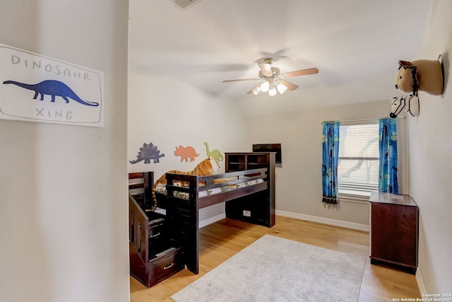 154 Roseheart, San Antonio, TX 78259 - bedroom featuring wood finished floors, baseboards, a ceiling fan, and lofted ceiling