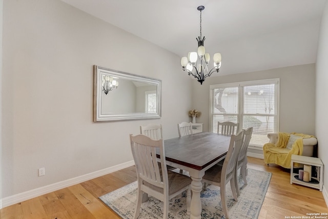 154 Roseheart, San Antonio, TX 78259 - dining area featuring a chandelier, healthy amount of natural light, baseboards, and light wood-style flooring