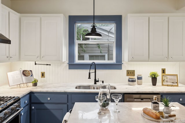 1023 Gramercy, San Antonio, TX 78201 - kitchen with a sink, blue cabinets, white cabinetry, and pendant lighting