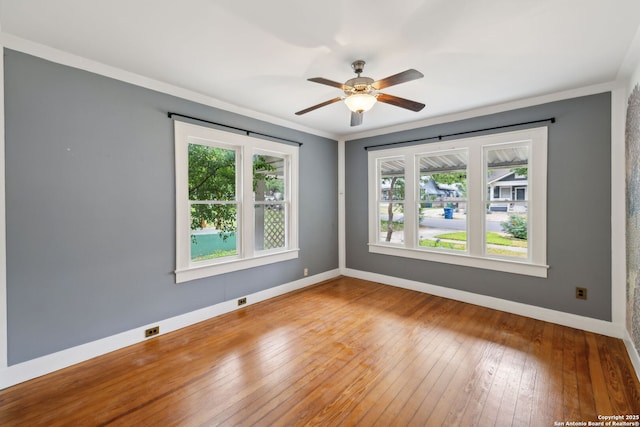 1023 Gramercy, San Antonio, TX 78201 - spare room with ceiling fan, wood-type flooring, baseboards, and crown molding