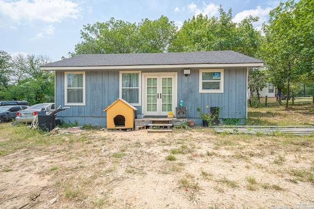 23135 Blackjack Pass, San Antonio, TX 78264 - view of front facade featuring french doors and board and batten siding