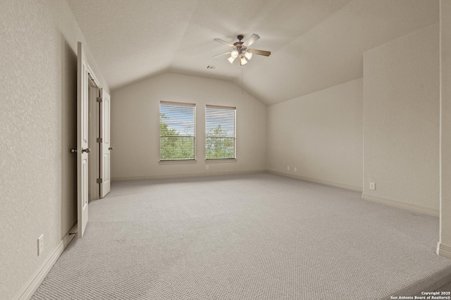 1238 Via Belcanto, San Antonio, TX 78260 - additional living space featuring vaulted ceiling, light colored carpet, a ceiling fan, and baseboards