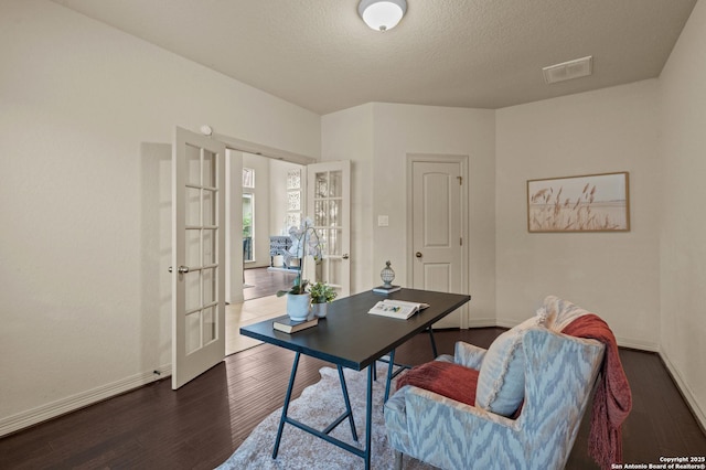 1238 Via Belcanto, San Antonio, TX 78260 - home office with french doors, dark wood finished floors, baseboards, and a textured ceiling