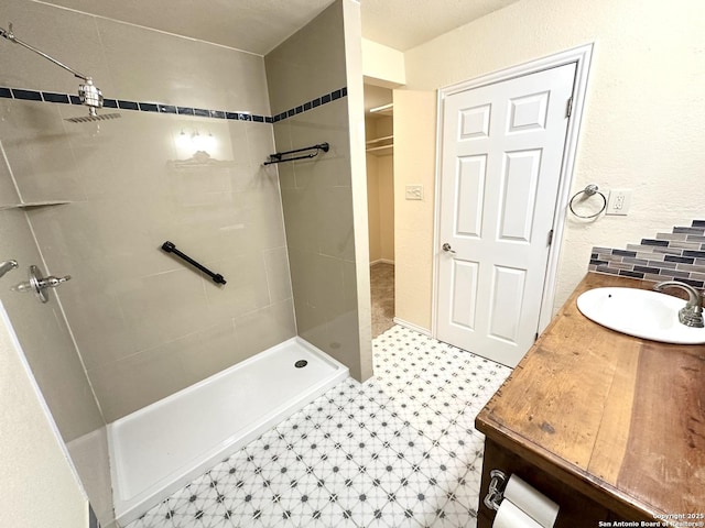 207 Freiling, San Antonio, TX 78213 - full bath featuring tile patterned floors, a tile shower, and vanity