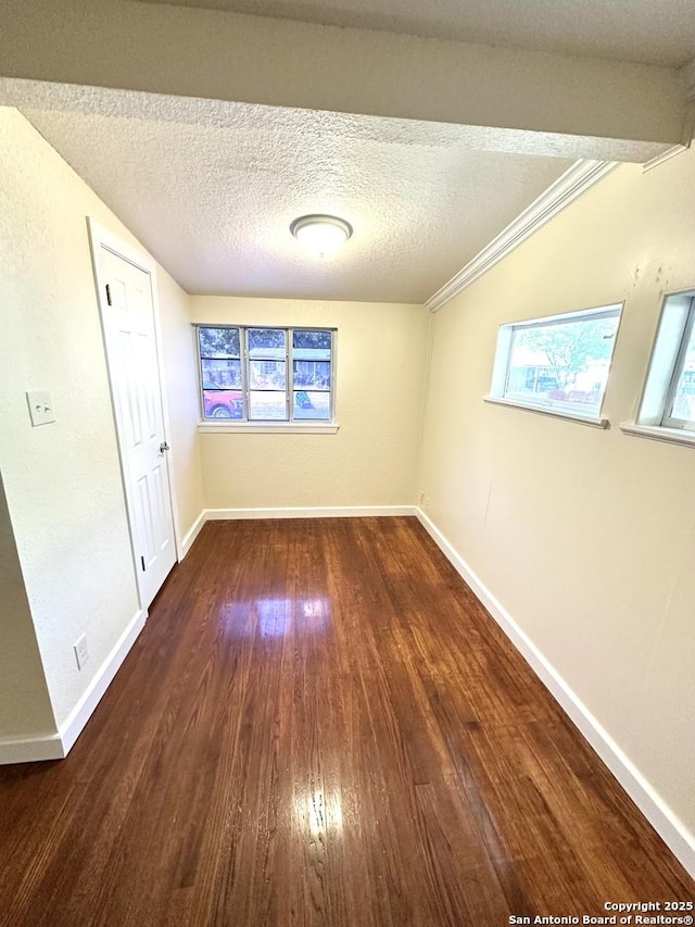 207 Freiling, San Antonio, TX 78213 - unfurnished room with wood finished floors, a textured ceiling, and baseboards