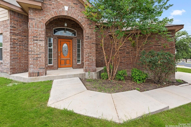 8903 Derby Dan, Converse, TX 78109 - doorway to property with brick siding and a lawn