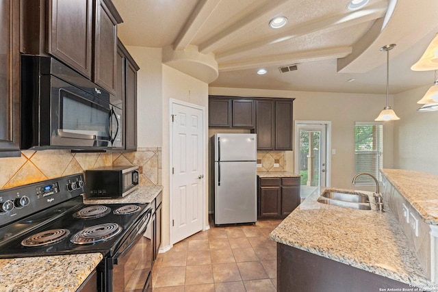 8903 Derby Dan, Converse, TX 78109 - kitchen featuring black appliances, a sink, dark brown cabinets, decorative backsplash, and recessed lighting