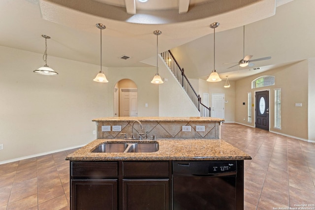 8903 Derby Dan, Converse, TX 78109 - kitchen featuring a sink, dishwasher, ceiling fan, open floor plan, and a kitchen island with sink
