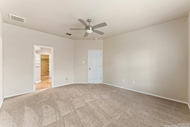8903 Derby Dan, Converse, TX 78109 - unfurnished bedroom with carpet, baseboards, and a ceiling fan