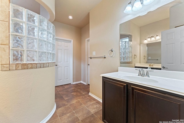 8903 Derby Dan, Converse, TX 78109 - bathroom with vanity and baseboards