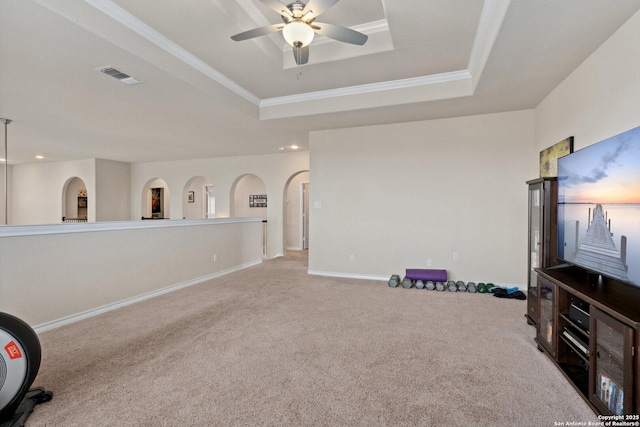 17906 Via Del Arbol, San Antonio, TX 78257 - unfurnished living room with a raised ceiling, carpet flooring, a ceiling fan, recessed lighting, and crown molding