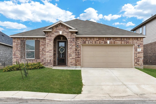 5219 Wolf Bane, San Antonio, TX 78261 - view of front facade with brick siding, roof with shingles, a front yard, driveway, and an attached garage