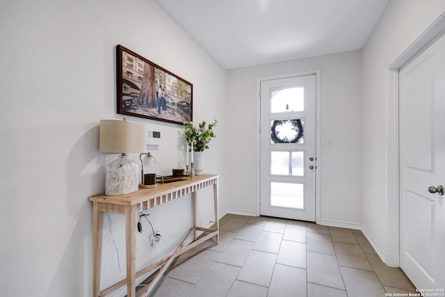 5219 Wolf Bane, San Antonio, TX 78261 - entryway with baseboards and light tile patterned floors