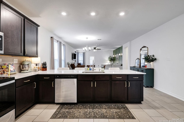 5219 Wolf Bane, San Antonio, TX 78261 - kitchen featuring dishwasher, a sink, electric range, light countertops, and recessed lighting