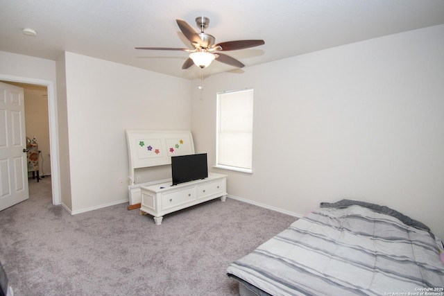 9668 Shorebird, San Antonio, TX 78245 - bedroom with carpet flooring, baseboards, and a ceiling fan