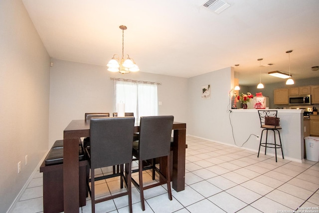9668 Shorebird, San Antonio, TX 78245 - dining room featuring a chandelier and baseboards