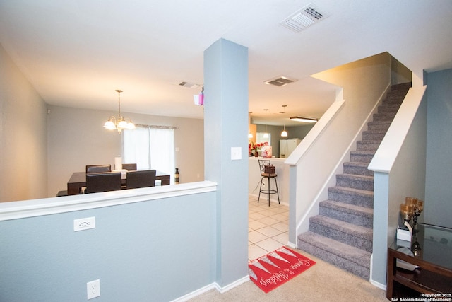 9668 Shorebird, San Antonio, TX 78245 - kitchen with a chandelier, hanging light fixtures, and carpet floors