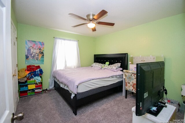 9668 Shorebird, San Antonio, TX 78245 - carpeted bedroom with a ceiling fan
