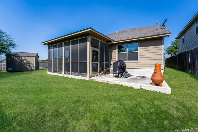 4310 Gambels Quail, Converse, TX 78109 - back of property with a sunroom, a patio area, and a shingled roof