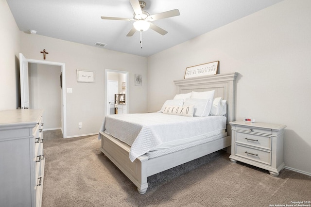 700 Ridge Vw, Seguin, TX 78155 - bedroom featuring light carpet, baseboards, and a ceiling fan