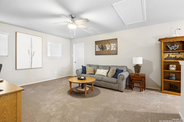 700 Ridge Vw, Seguin, TX 78155 - carpeted living area with attic access, a ceiling fan, and baseboards
