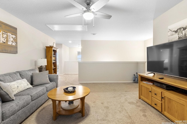 700 Ridge Vw, Seguin, TX 78155 - living room featuring light carpet, ceiling fan, and baseboards