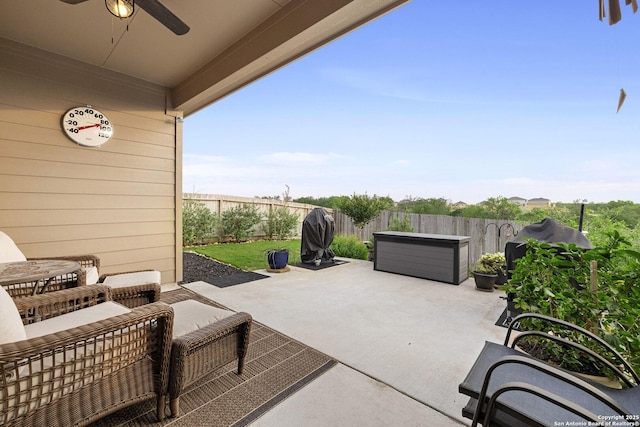 700 Ridge Vw, Seguin, TX 78155 - fenced backyard featuring a ceiling fan and a patio