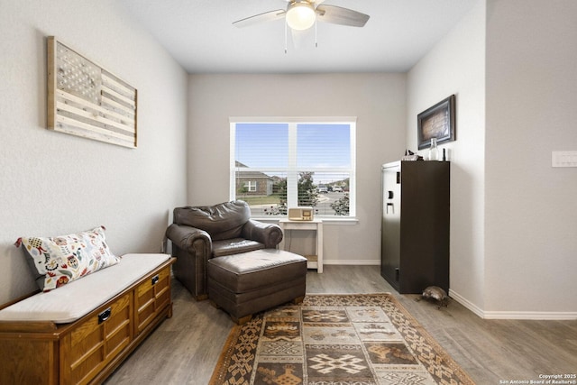 700 Ridge Vw, Seguin, TX 78155 - sitting room featuring wood finished floors, a ceiling fan, and baseboards