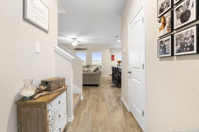 700 Ridge Vw, Seguin, TX 78155 - corridor with light wood finished floors and a textured wall