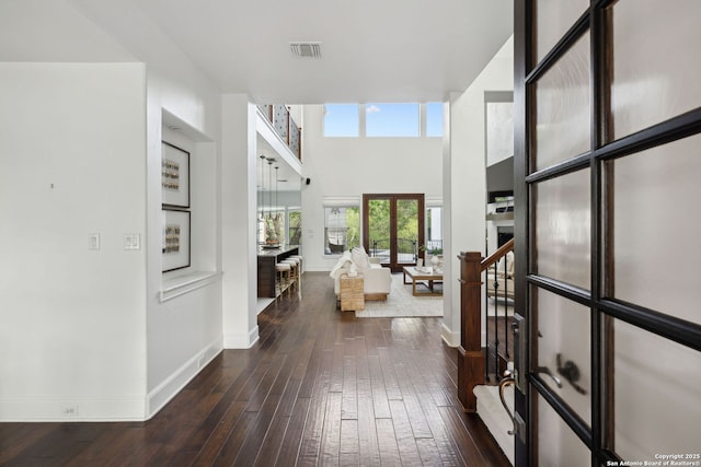 17706 Wild Basin, San Antonio, TX 78258 - entrance foyer with baseboards, wood-type flooring, and a high ceiling