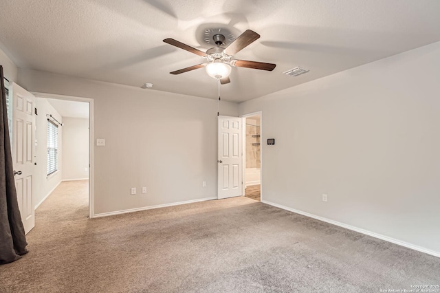 10110 Raspberry Oak, San Antonio, TX 78223 - carpeted spare room featuring a ceiling fan and baseboards