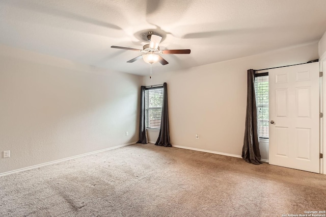 10110 Raspberry Oak, San Antonio, TX 78223 - carpeted spare room with a ceiling fan and baseboards