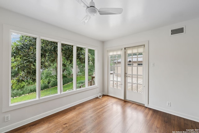 113 E Sunset, San Antonio, TX 78209 - unfurnished room featuring baseboards, plenty of natural light, and ceiling fan