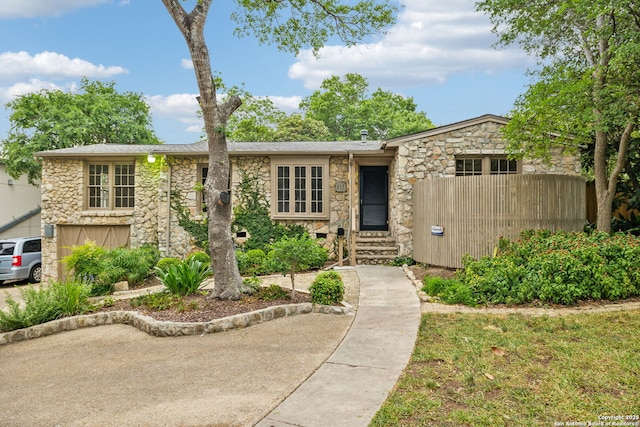 113 E Sunset, San Antonio, TX 78209 - mid-century modern home featuring stone siding and entry steps