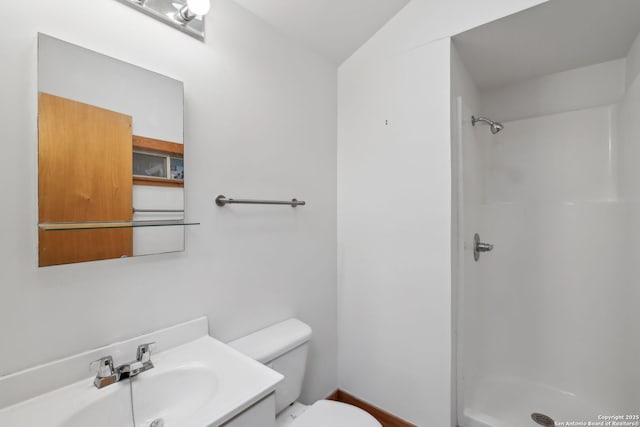 113 E Sunset, San Antonio, TX 78209 - full bath featuring a stall shower, toilet, and vanity