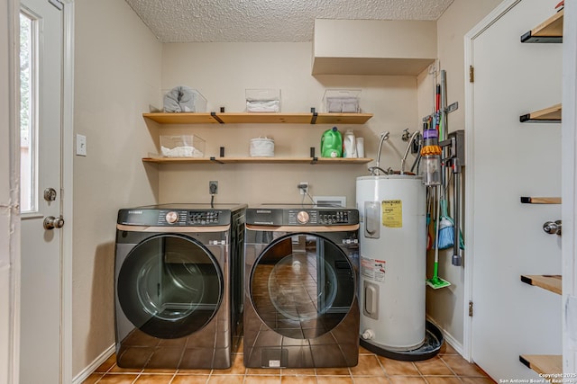 13426 Marceline, San Antonio, TX 78232 - laundry room featuring water heater, independent washer and dryer, tile patterned flooring, a textured ceiling, and baseboards