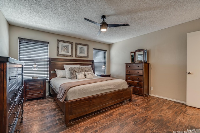 13426 Marceline, San Antonio, TX 78232 - bedroom featuring a textured ceiling, dark wood finished floors, and a ceiling fan