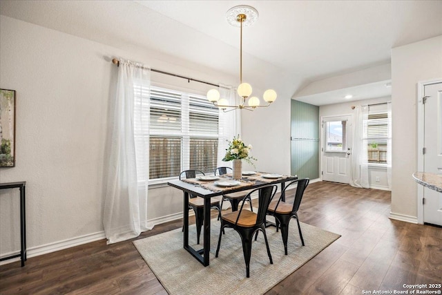 9702 Tupelo Holw, San Antonio, TX 78254 - dining room with a chandelier, dark wood-type flooring, and baseboards