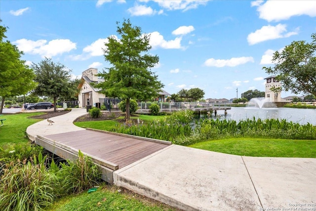 9702 Tupelo Holw, San Antonio, TX 78254 - surrounding community featuring a water view and a yard