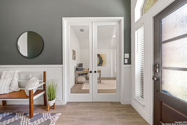 9102 War Wagon, San Antonio, TX 78254 - entryway featuring french doors, light wood-style floors, and vaulted ceiling