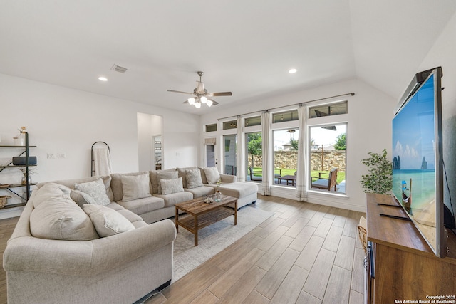 9102 War Wagon, San Antonio, TX 78254 - living room with light wood-style floors, a ceiling fan, recessed lighting, and vaulted ceiling