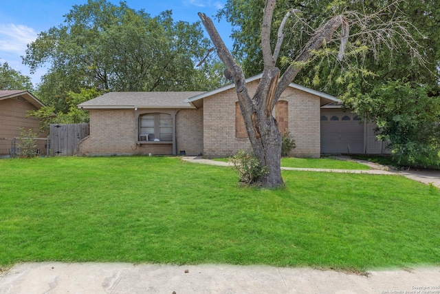 4710 Casa Espana St, San Antonio, TX 78233 - view of front of property with brick siding, a garage, and roof with shingles