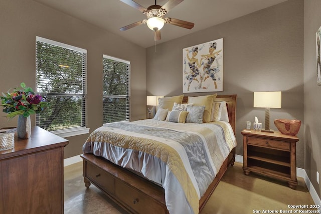835 Shady Holw, New Braunfels, TX 78132 - bedroom featuring baseboards, finished concrete floors, and ceiling fan