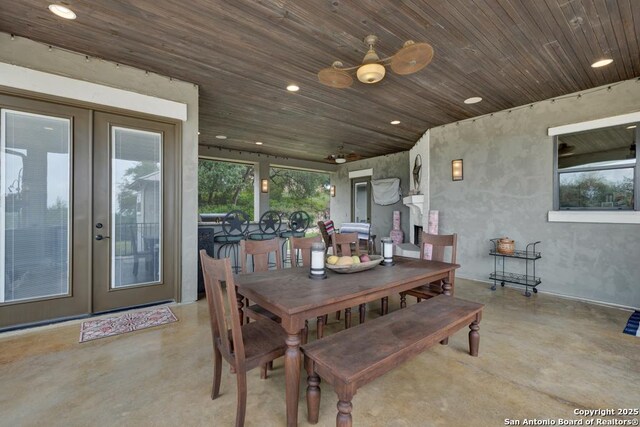 835 Shady Holw, New Braunfels, TX 78132 - dining room featuring finished concrete floors, ceiling fan, french doors, wooden ceiling, and recessed lighting