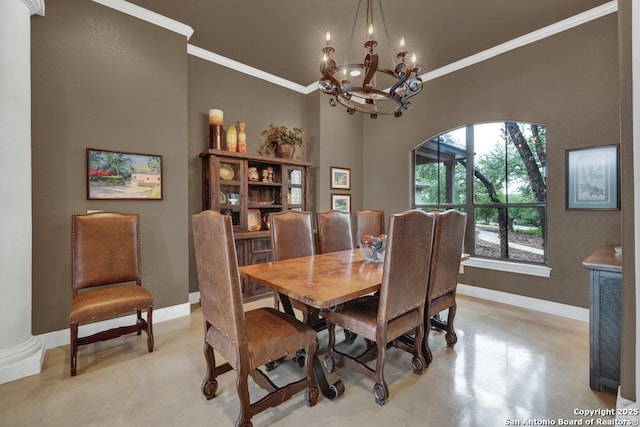 835 Shady Holw, New Braunfels, TX 78132 - dining space featuring crown molding, baseboards, a chandelier, and concrete floors